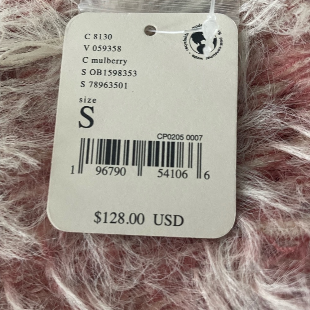 Free People tunic sweater with tags. Color: mulberry